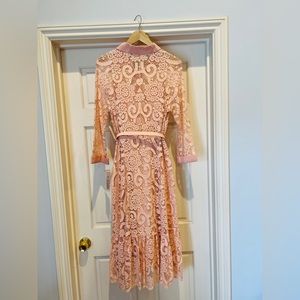Brand new never worn Nanette Lepore midi dress in peach with slip in Size 8.